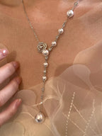 Pearl flower Y-necklace from Shopimist featuring delicate white pearls and floral design, elegant jewelry for special occasions.