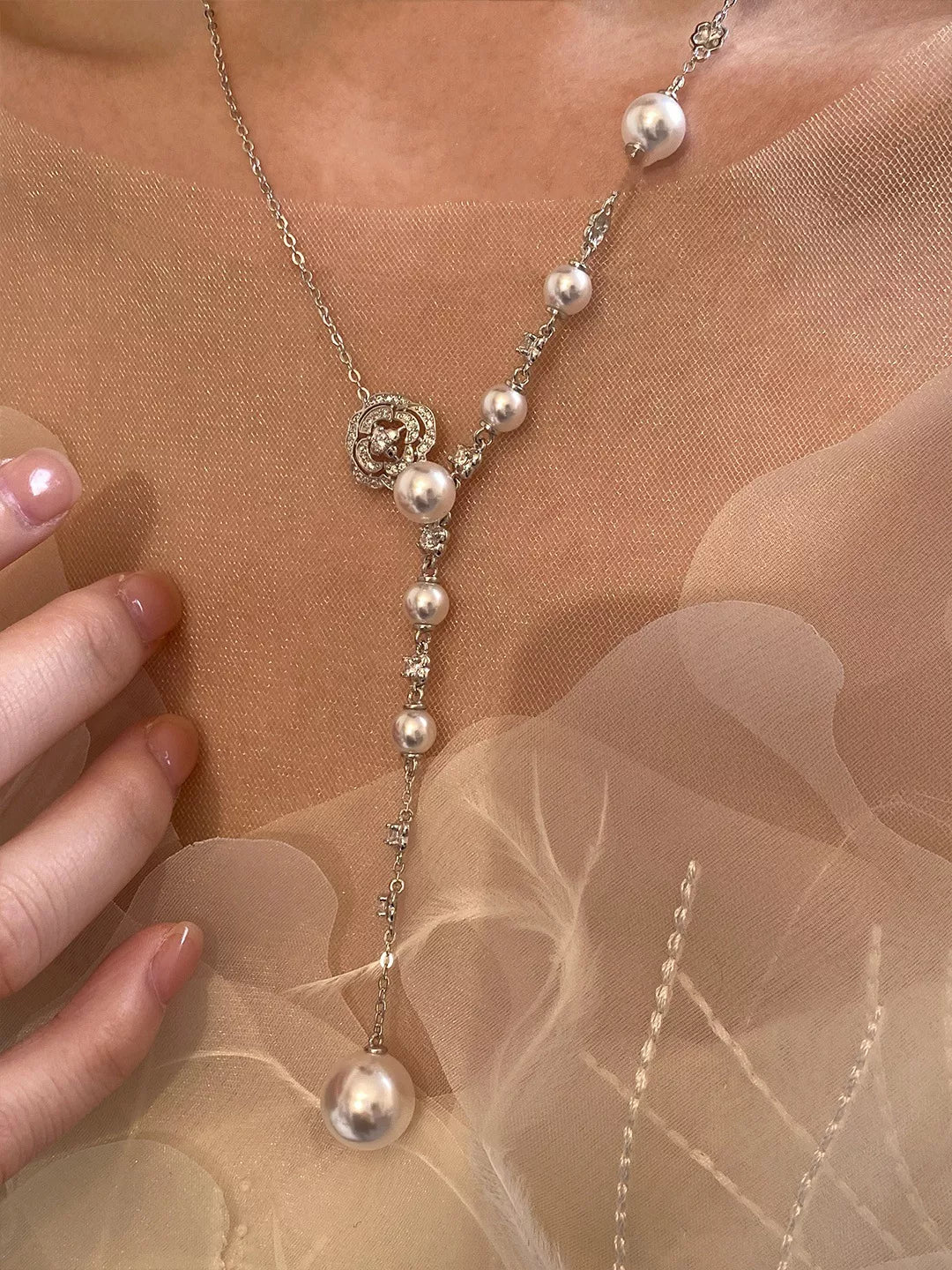 Pearl flower Y-necklace from Shopimist featuring delicate white pearls and floral design, elegant jewelry for special occasions.