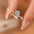 Sterling silver layered ring with 1 carat moissanite gemstone, elegant jewelry piece showcasing sparkling stones and intricate design