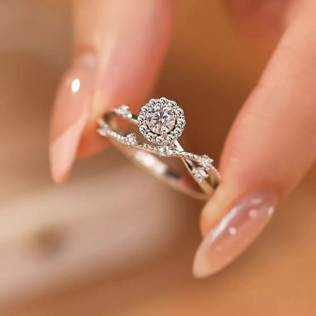 Sterling silver layered ring with 1 carat moissanite gemstones, showcasing a sparkling, elegant jewelry piece.