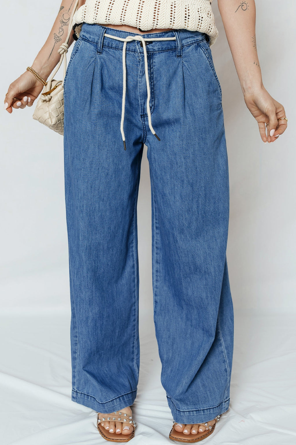 Oakleigh on wide leg jeans by Threaded Pear, featuring a high-waisted design and wide-leg fit in classic denim fabric.