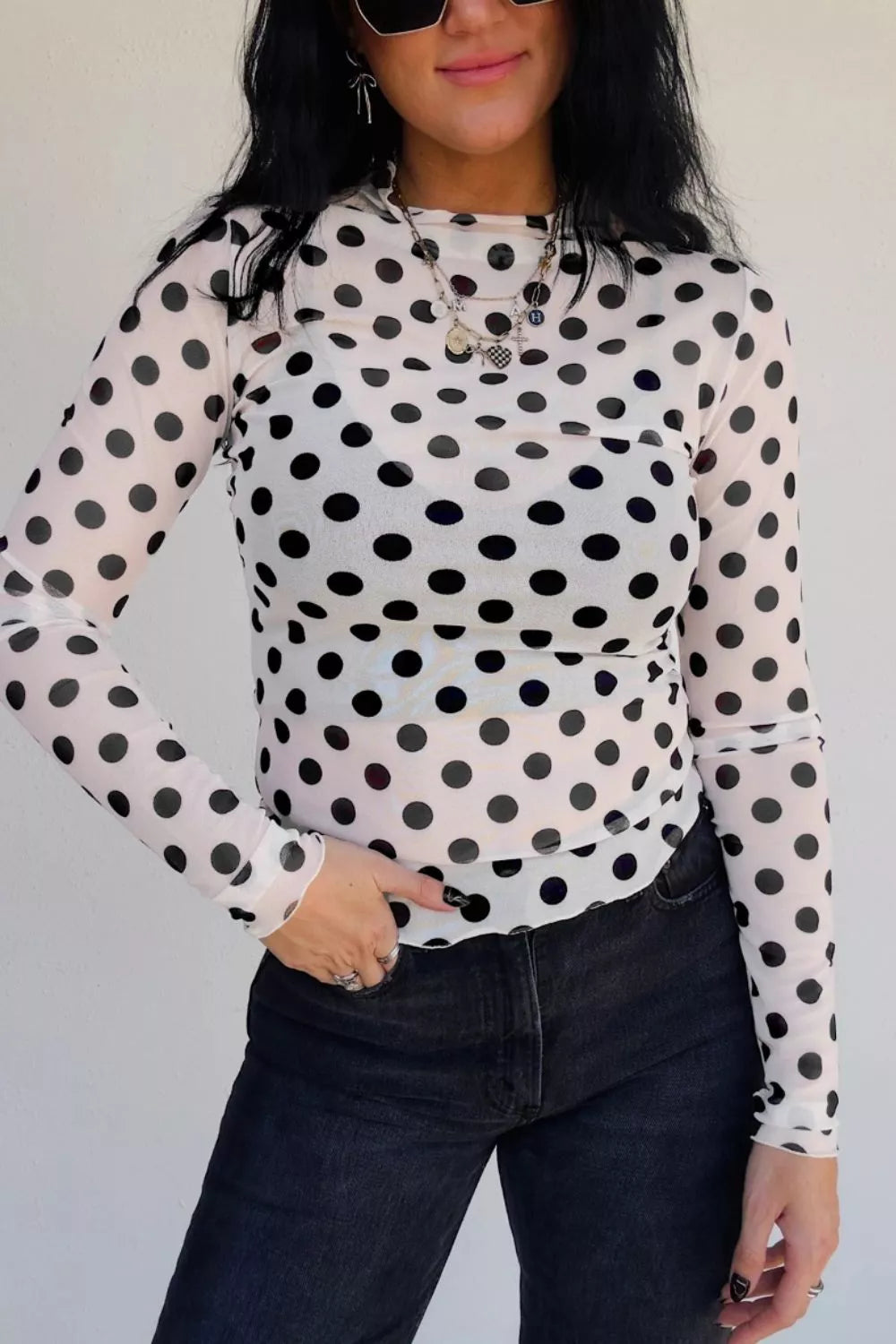 Polka dot mesh long sleeve sheath top with stand neck by Plush Fashion Hub, featuring a stylish polka dot pattern and fitted silhouette.