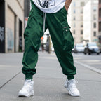 Men’s multi-pocket cargo pants from Plush Fashion Hub featuring a streetwear style with drawstring waist and multiple functional pockets.