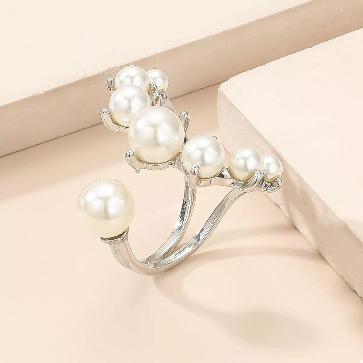 Shopimist alloy pearl open ring featuring a sleek band with a central pearl accent and contemporary design.