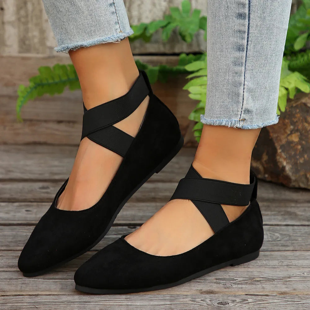 Women's Crisscross Point Toe Flat Slip-Ons by Trendsi, stylish black flats with a sleek crisscross design and pointed toe.
