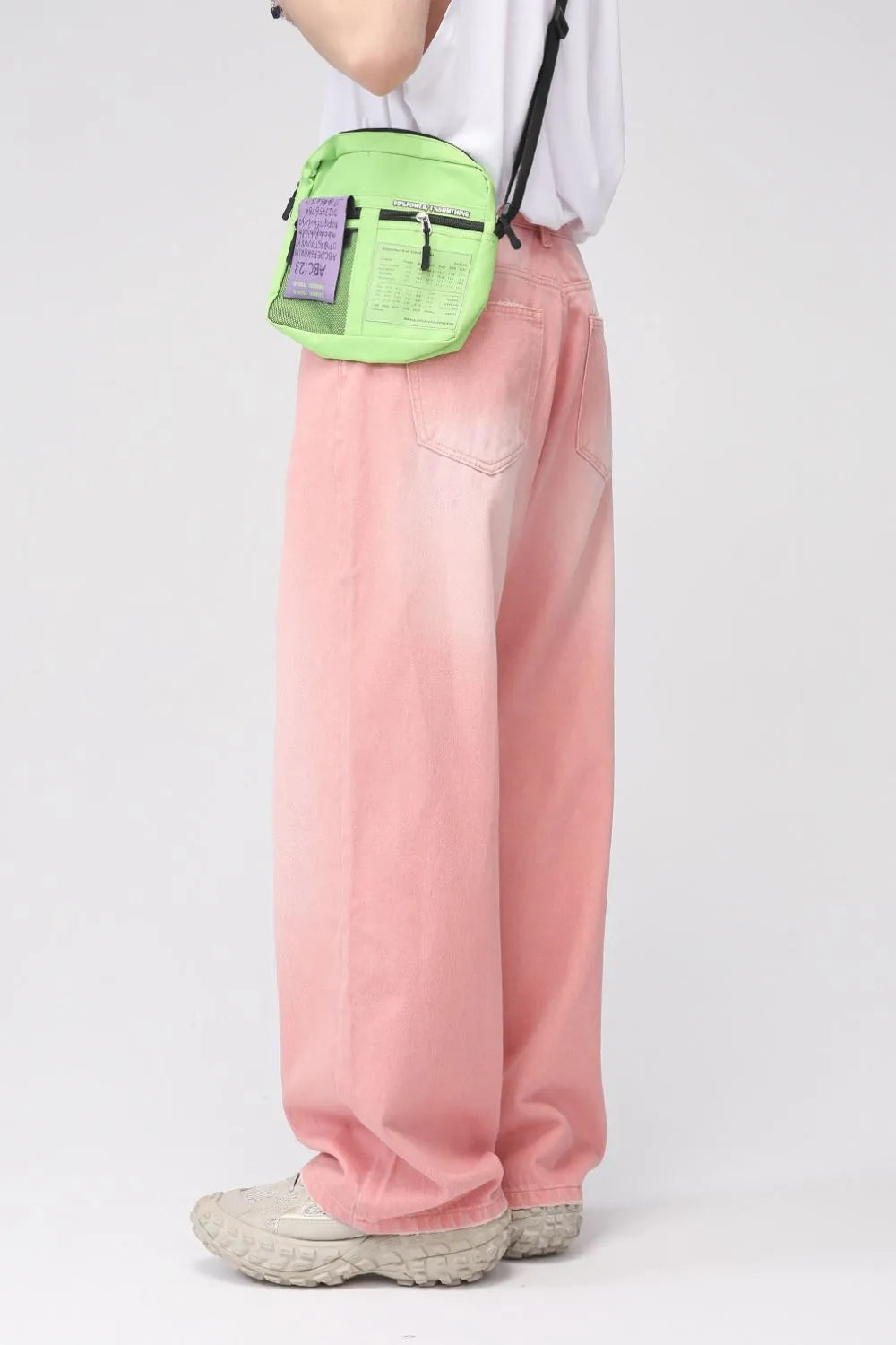Plush Fashion Shop pocketed baggy denim jeans with relaxed fit and large front and back pockets, shown on a model.