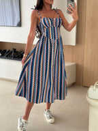 Women's striped tie-shoulder midi dress by Trendsi, casual summer dress with a relaxed fit and stylish neckline.