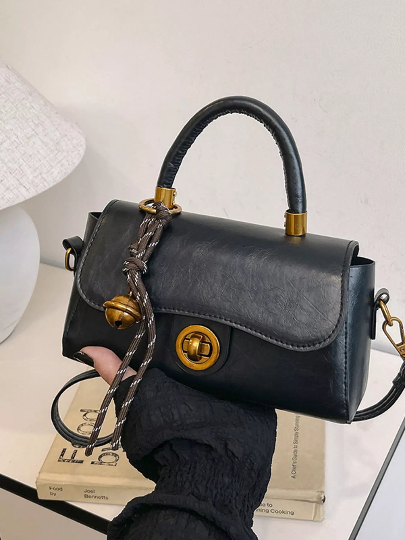 Simply Love top handle crossbody bag with adjustable strap and structured design, shown in a neutral color.