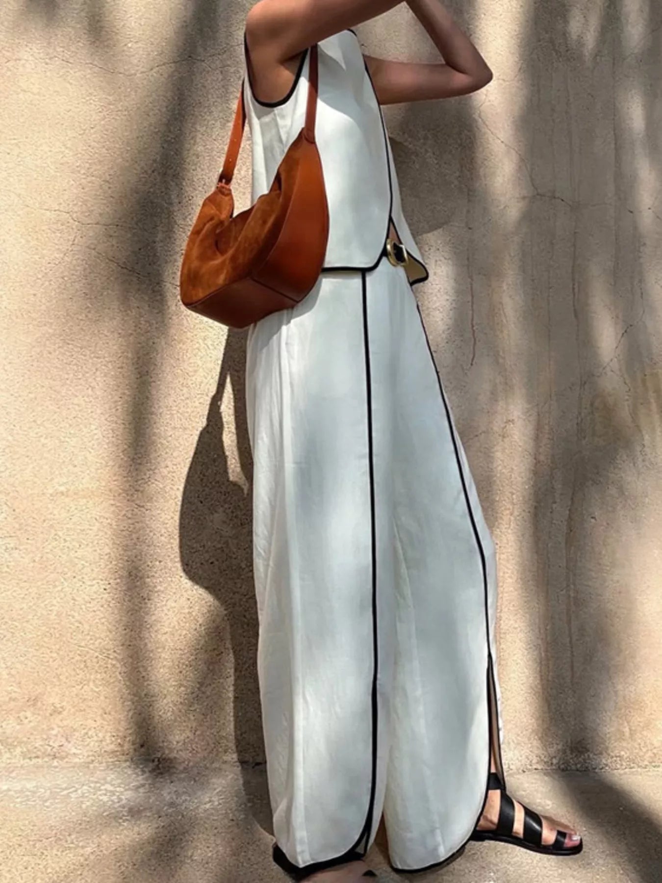 Contrast trim sleeveless top and wide-leg pants set by Plush Fashion Hub, stylish two-piece outfit with modern design.