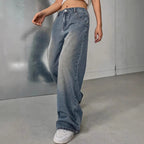 European and American women's washed vintage denim pants by LadyShow.Store, showing the relaxed fit and distressed details.