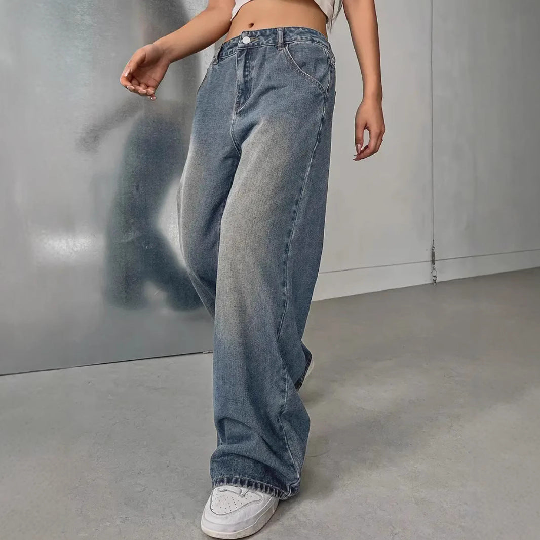 Women's washed vintage denim pants from Plush Fashion Hub, showing distressed details and classic five-pocket design.