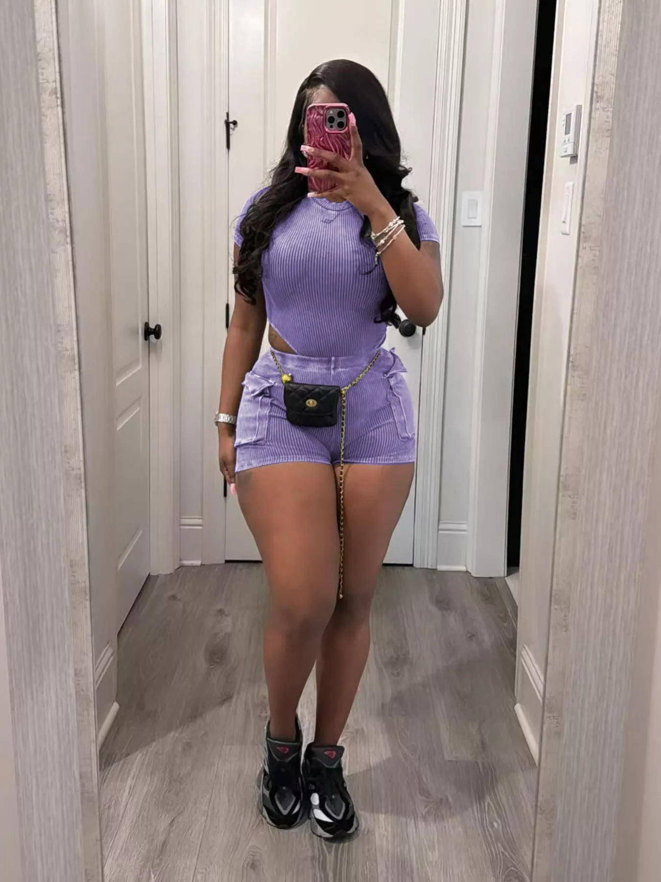 Ribbed knit bodysuit and shorts set by Shopimist, featuring a fitted design and soft fabric in a stylish two-piece ensemble.