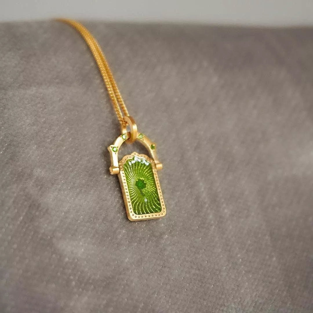18K gold-plated titanium steel pendant necklace featuring a sleek, modern design with a smooth, polished finish.