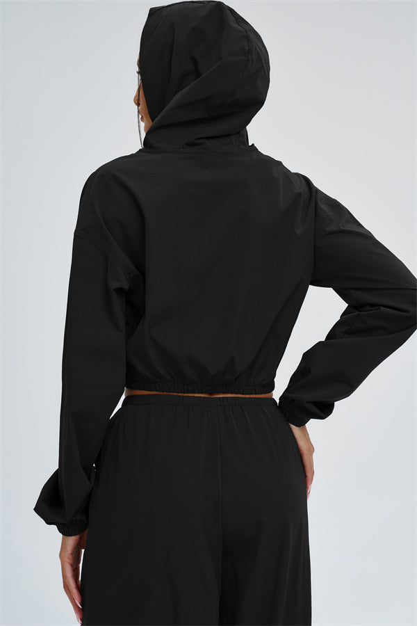Fitglutes Activewear UV protection crop hoodie, lightweight gymwear with long sleeves and breathable fabric for active workouts.