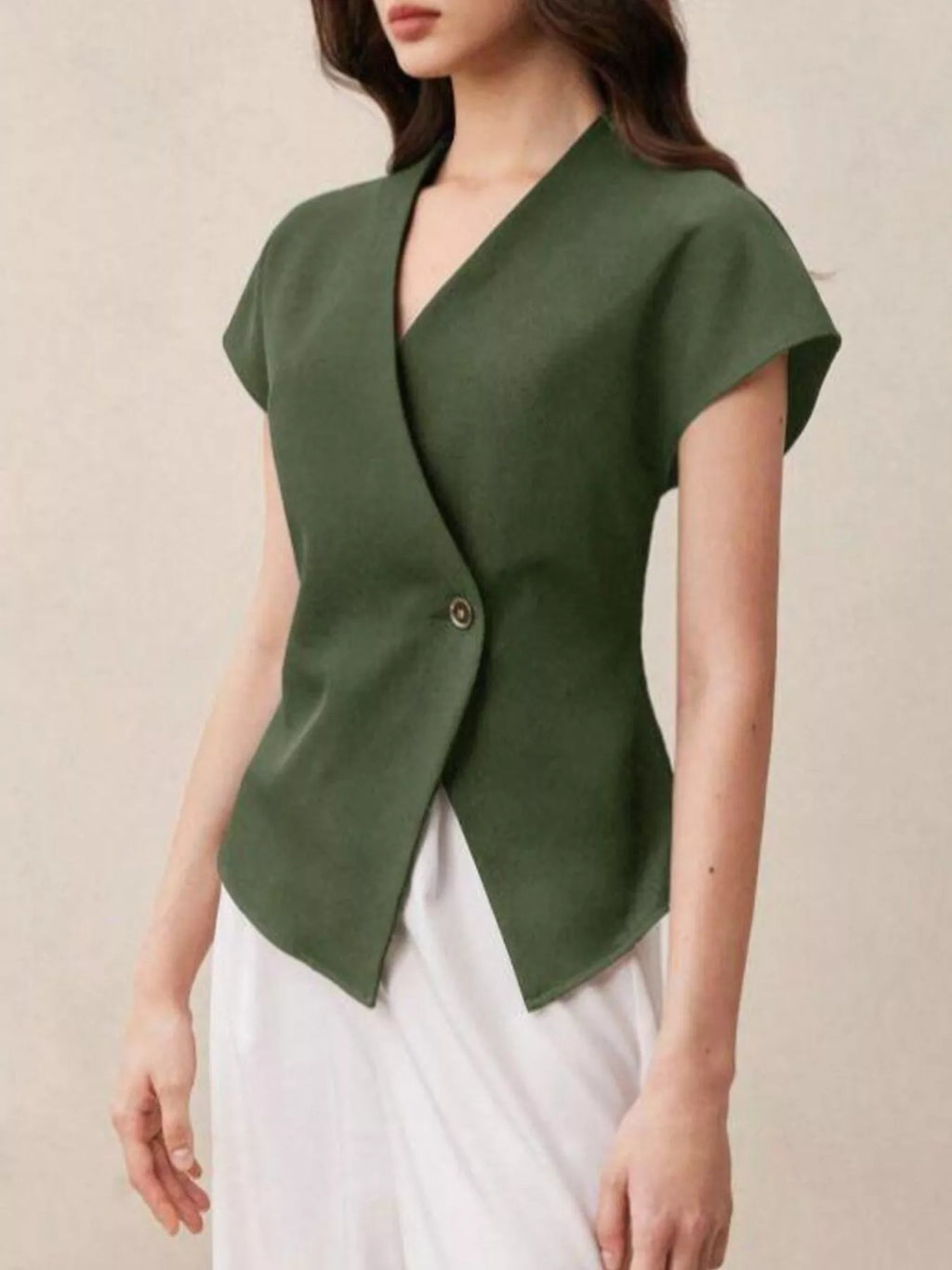 Wrap-front Trendsi one-button shirt in soft fabric, featuring a stylish front tie and long sleeves, perfect for casual or office wear.