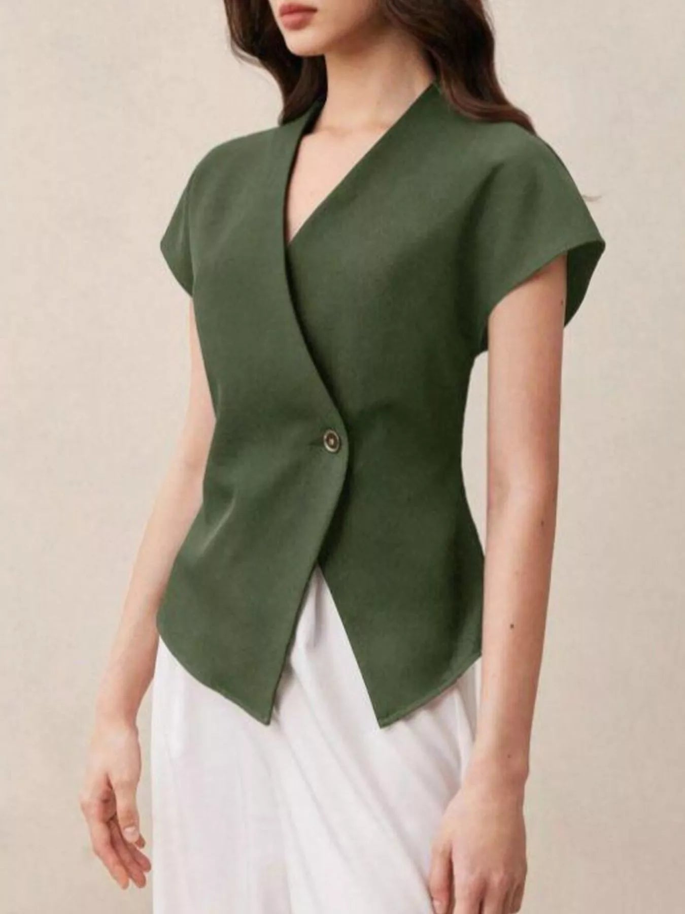 Wrap-front Trendsi one-button shirt in soft fabric, featuring a stylish front tie and long sleeves, perfect for casual or office wear.