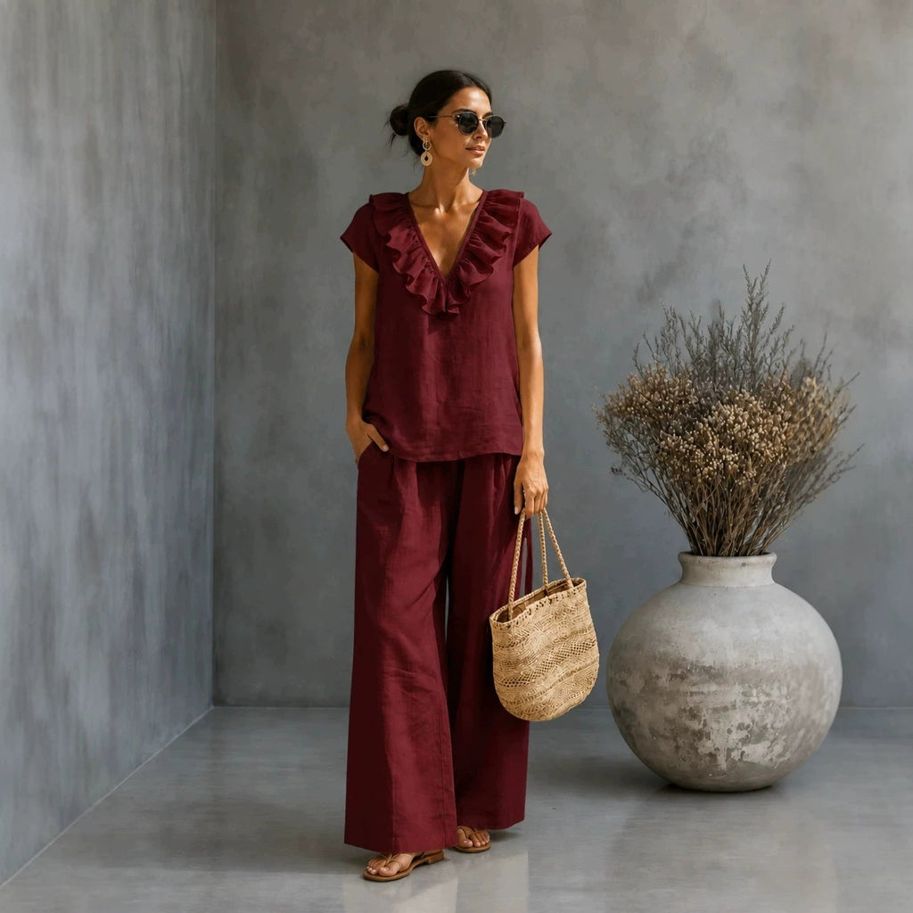 Plush Fashion Hub women's casual two-piece set with V-neck ruffled hem top and wide-leg pants, perfect for relaxed style.