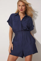 Women's cotton linen loose-fit workwear jumpsuit with pockets, stylish and comfortable for casual or workwear, by Plush Fashion Hub.
