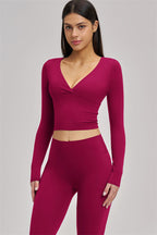 Fitglutes Activewear long sleeve crop top, stylish gymwear with a fitted design, perfect for workout and sports activities.