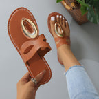 Women's open toe low heel sandals by Trendsi with golden accent detail and stylish design.