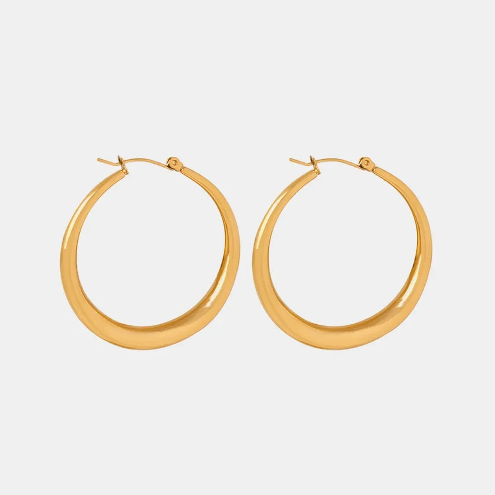 18K gold-plated hoop earrings with a sleek, polished finish, showcasing classic round design and smooth edges.