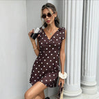Women's sleeveless V-neck mini dress by FitiqueFit with lace-up bow detail and stylish, fitted design.