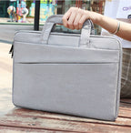 Black Plush Fashion Hub laptop bag with padded compartments and sleek handles, designed for business and professional use.