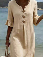 Plus size Midi dress with button decor, ruffle sleeves, and a full-length design by Trendsi.