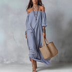 Women's striped loose-fit flared maxi dress from FitiqueFit, featuring a flowing design perfect for holidays and vacations.