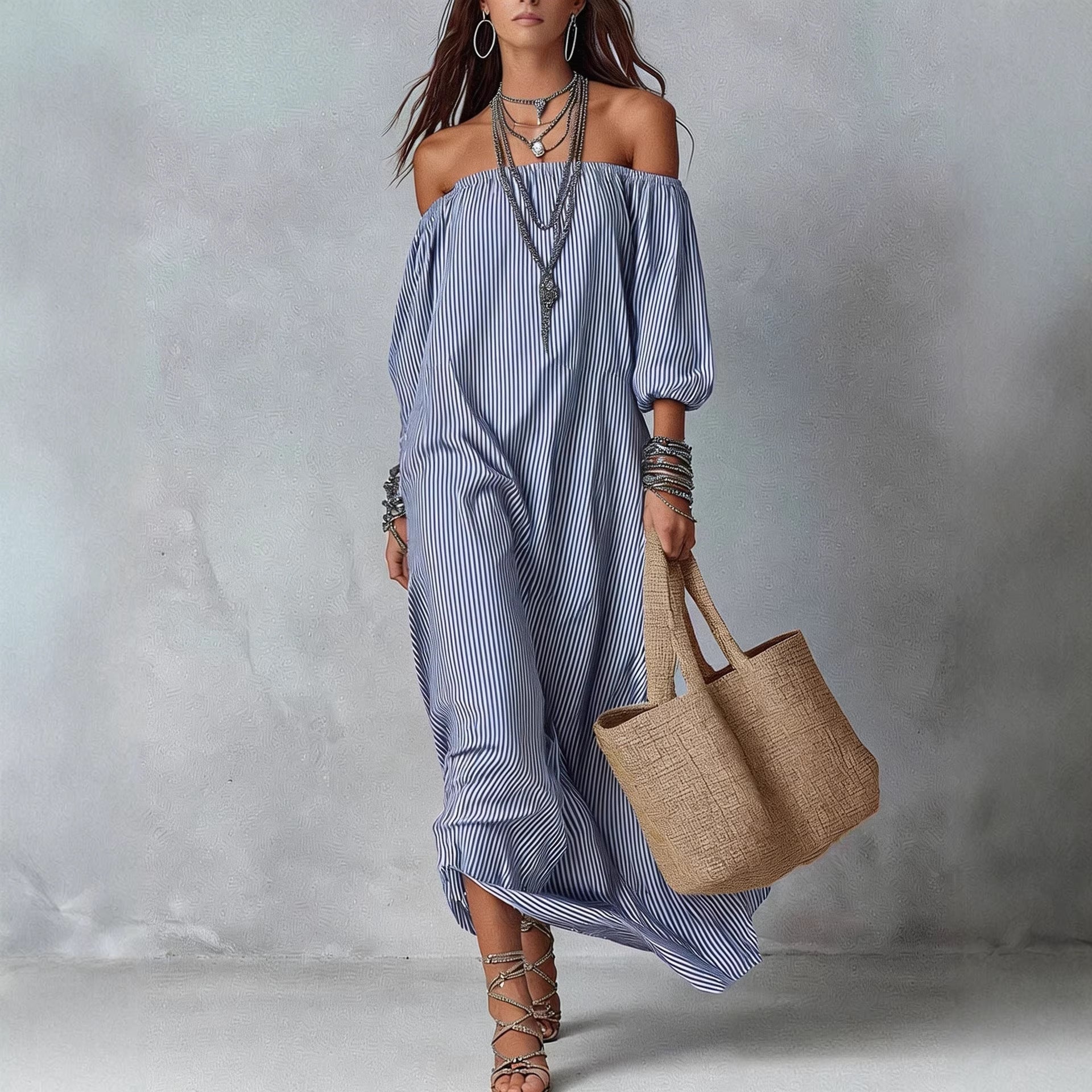 Women's striped loose-fit flared maxi dress from FitiqueFit, featuring a flowing design perfect for holidays and vacations.