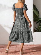 Floral print smocked ruffle sleeve midi dress by Trendsi, lightweight summer dress with feminine ruffle details and midi length.