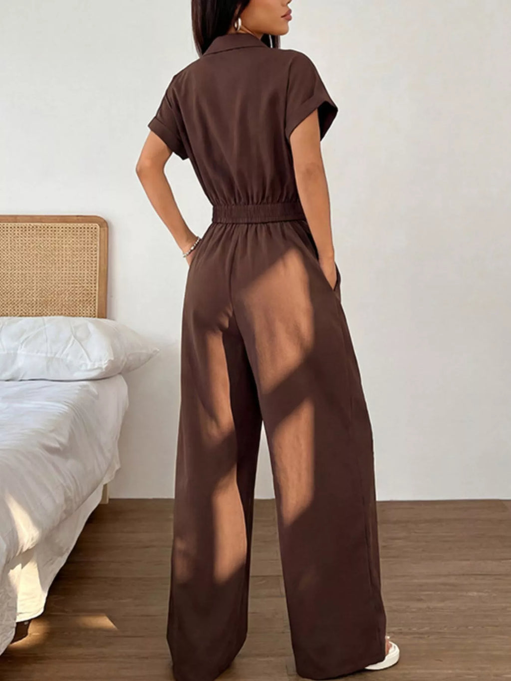 Shopimist cargo pocket zipper front jumpsuit featuring a utility design, with visible pockets and a front zipper closure.