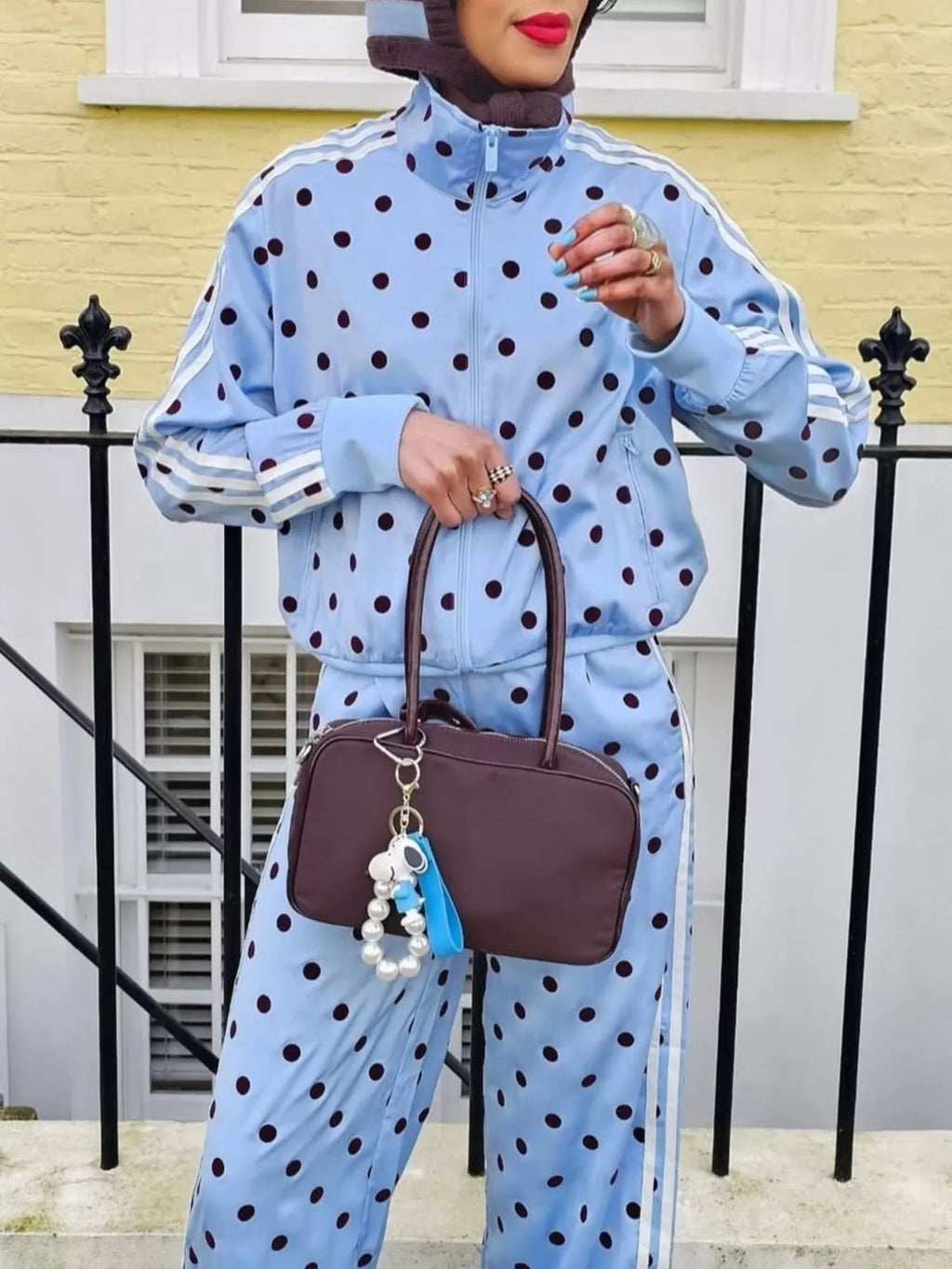 Polka dot zip-up outerwear and matching pants set by Plush Fashion Hub, featuring a stylish polka dot pattern and comfortable fit.