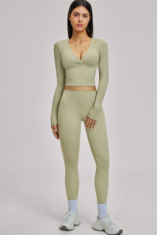 Fitglutes Activewear long sleeve crop top from The Swoon collection, featuring a fitted design and comfortable athletic fabric.