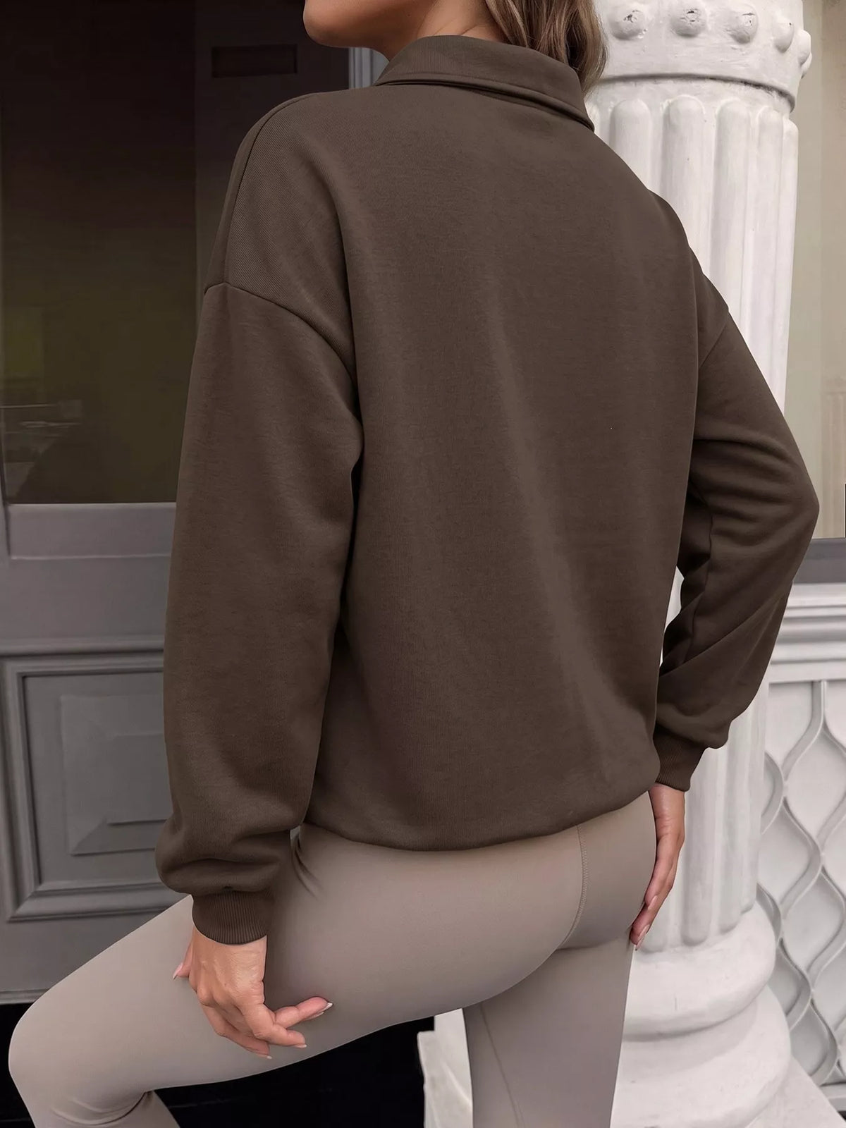 Trendsi polo collar dropped shoulder sweatshirt in soft fabric with relaxed fit and stylish design.