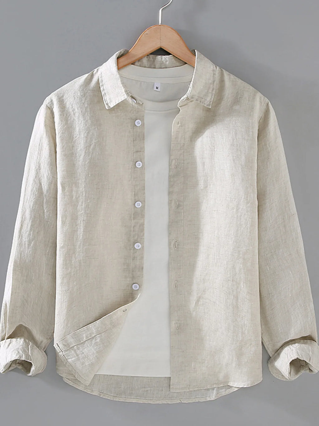 Plus size men's button-up long sleeve shirt by Shopimist, displayed on a hanger showing front view and classic collar.