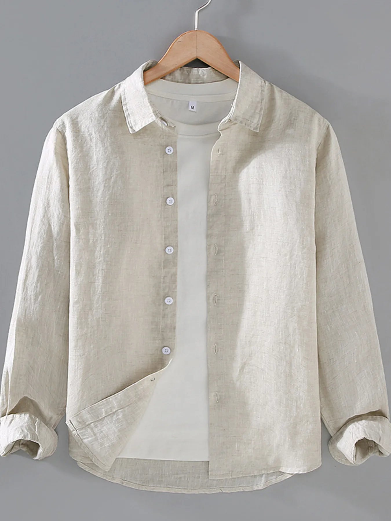 Plus size men's button-up long sleeve shirt by Shopimist, displayed on a hanger showing front view and classic collar.