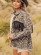 VYSN leopard fringe detail collared denim jacket showing leopard print fringe accents and classic blue denim fabric.