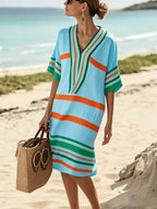 Plus size women's striped half-sleeve midi dress by Plush Fashion Hub, casual chic everyday wear, with a relaxed fit and stylish design.