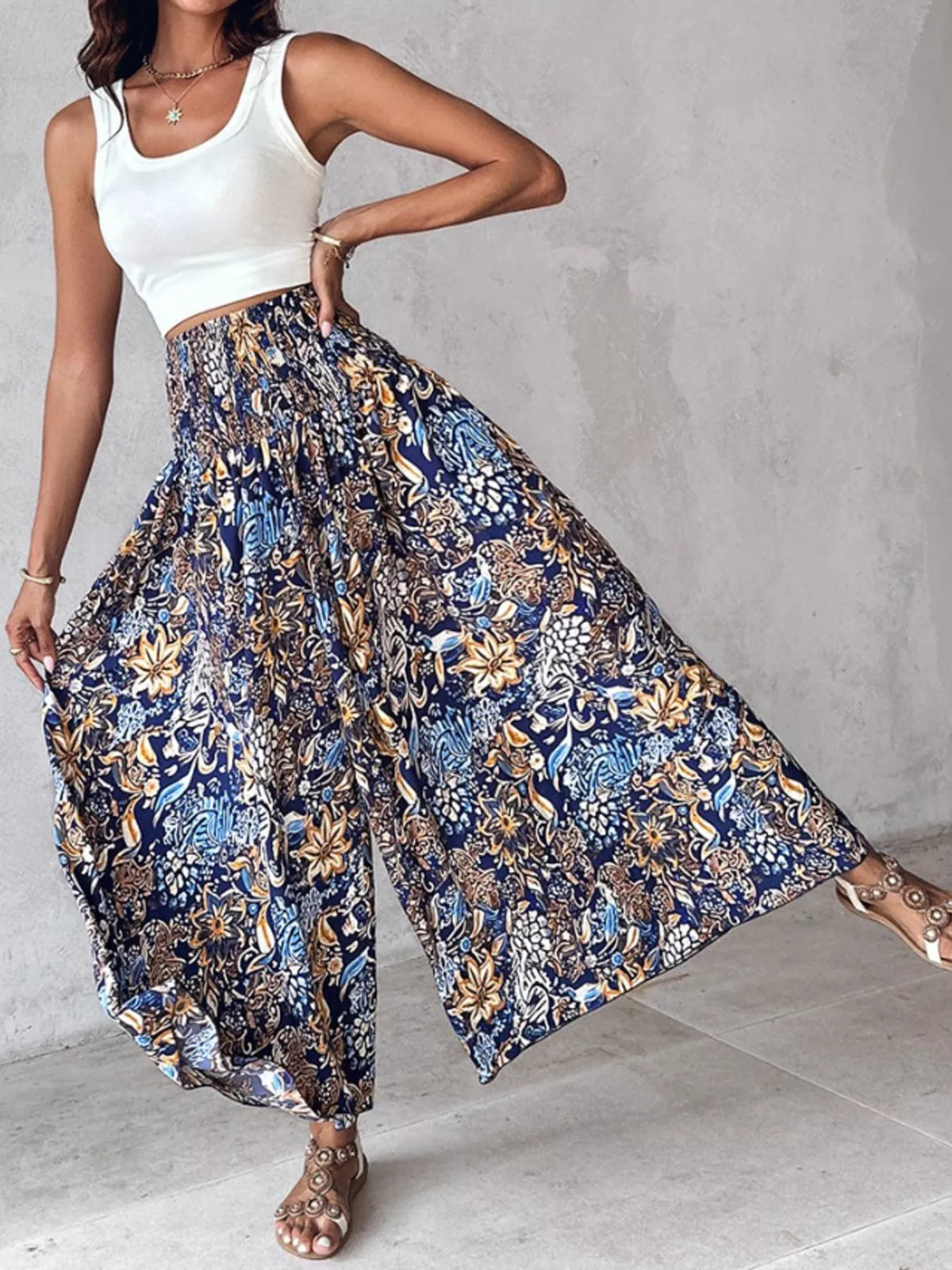 Printed wide-leg pants from Plush Fashion Hub featuring a stylish floral pattern and relaxed fit, displayed on a model.