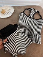 Striped tank top and shorts set from Trendsi, featuring a casual summer look with a sleeveless tank and matching shorts.