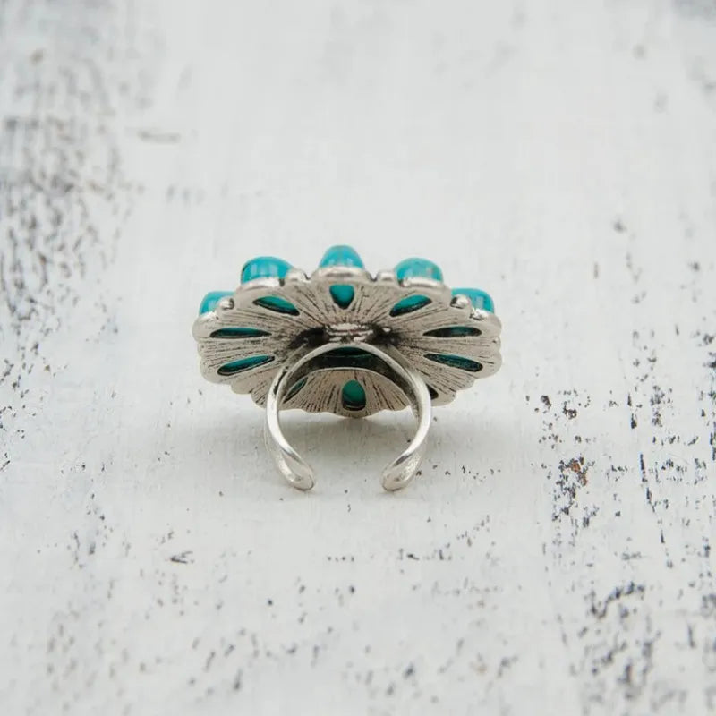 Artificial turquoise alloy flower ring featuring a detailed floral design, stylish jewelry piece by Shopimist.