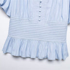 Women's slim-fit puff-sleeve blouse with ruffle trim, casualwear from FitiqueFit, featuring elegant design and lightweight fabric.