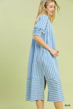 Umgee striped puff sleeve midi dress displayed on a model, showcasing its stylish design and casual elegance.