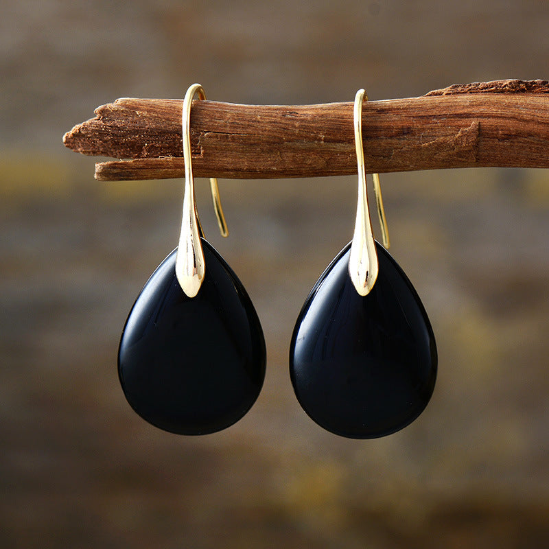 Elegant crystal dangle earrings by Shopimist featuring sparkling gemstones and silver hooks for a stylish accessory.