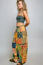Printed patchwork wide leg cotton pants with side drawstring, designed as a relaxed trendy dress style.