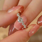 Sterling silver moissanite ring with a 2-carat center stone, elegant jewelry piece from Shopimist.