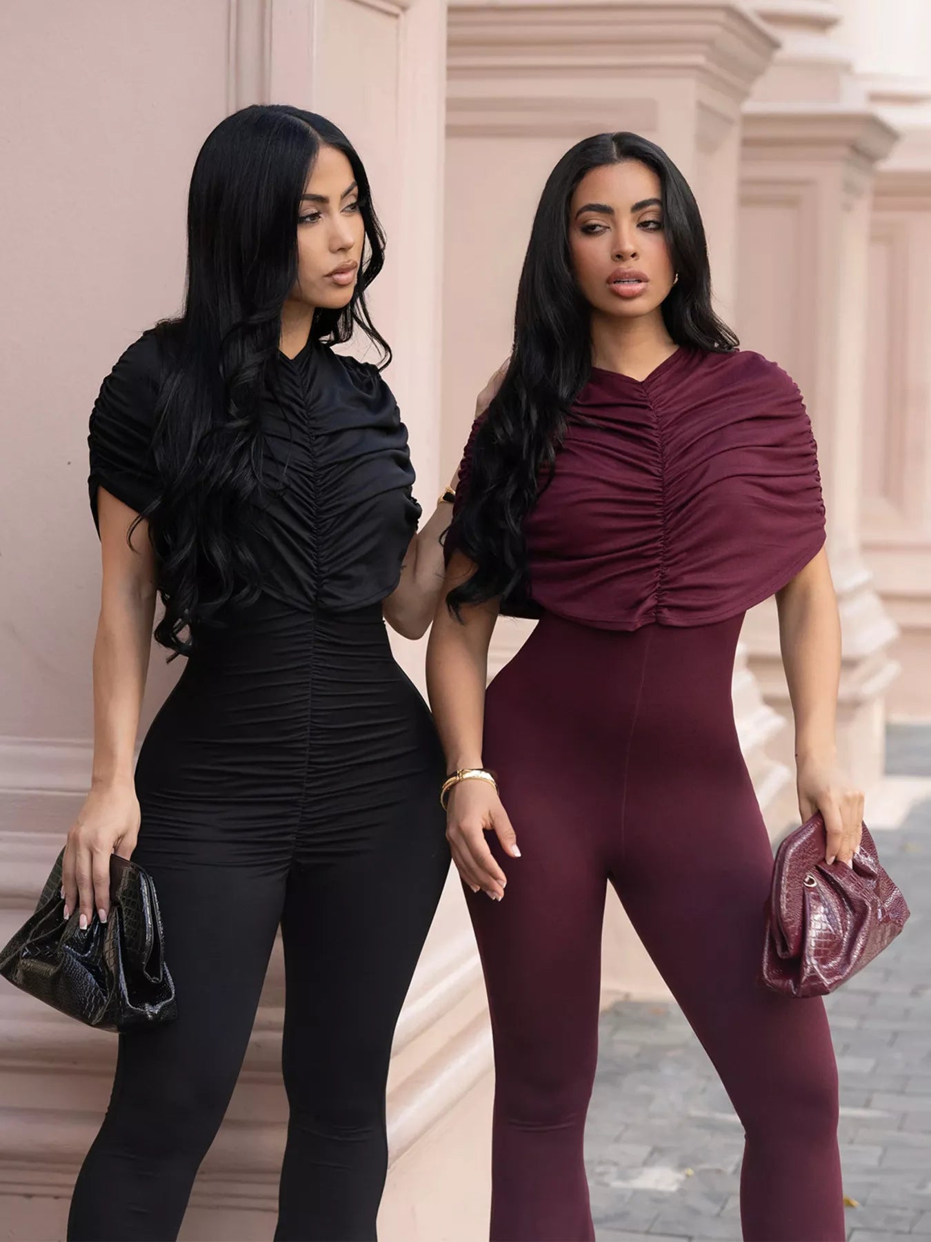 Ruched flare leg jumpsuit by Trendsi featuring a fitted bodice, flared pants, and stylish design in a solid color.