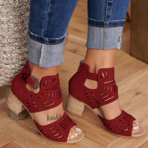 Women's floral cutout chunky heels sandals by Trendy Attic Store01 with open toe and block heel design.