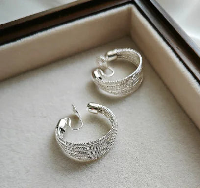 Silver multi-string fashion earrings featuring intricate design and sterling 925 silver for a stylish accessory look.